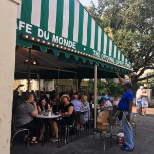 Man singing outside Cafe Du Monde, New Orleans