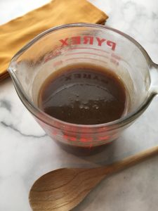 Photo of finished Caramel Sauce in a heat-proof dish. 