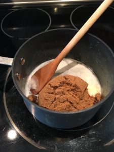 Photo of butter and sugars cooking in a saucepan.