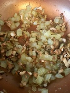 Photo of cooked onions and mushrooms.