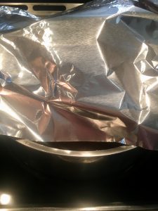 Photo of pot covered with foil.