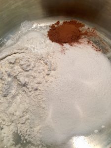 Photo of flour, cornstarch, sugar, and cocoa powder cooking. 