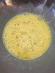 Photo of egg mixture for mozzarella sticks.