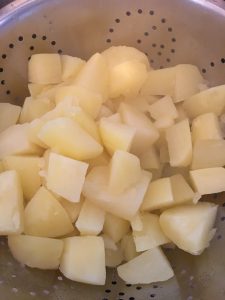 Boiled and drained potatoes. 