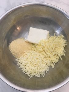 Gruyere, parmesan, mozzarella, and cheese cheeses.