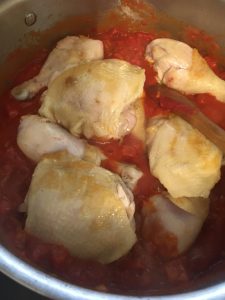 Add chicken the tomato sauce.