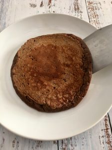 A Chocolate Pancake being served. 