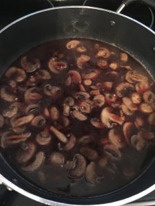 Mushrooms cooking in Marsala Wine and chicken stock.