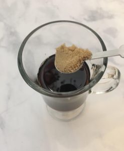 Add brown sugar to the coffee.