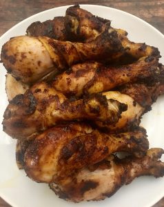 A Stack of Easy Dry Rub BBQ Chicken Drumsticks.