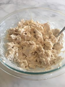 Baked chicken with mayo for chicken salad. 