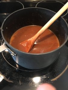 Photo of ingredients cooking into a caramel sauce. 