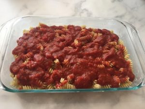 Photo of pasta with tomato sauce.