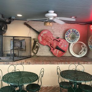 Photo of seating area at the Cafe Beignet, in the Musical Legends Park.