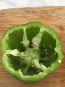 Photo of bell pepper with seeds and veins.