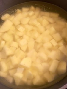 Photo of cubed potatoes.
