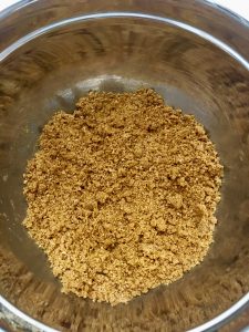 Photo of crushed graham cracker mixture.