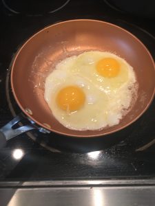 Photo of eggs frying.