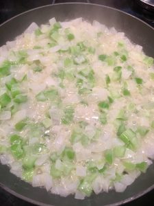 Photo of cooked onion and celery. 