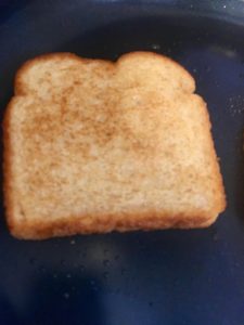 Photo of toasted bread in a pan.
