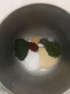 Salt, pepper, paprika, onion powder, garlic powder, dill, and parsley. 