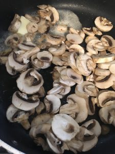 Add mushrooms to the pan.