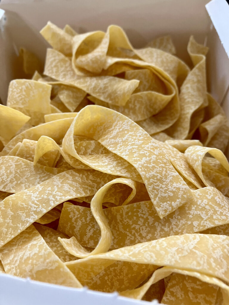 Uncooked Pappardelle Pasta in Box