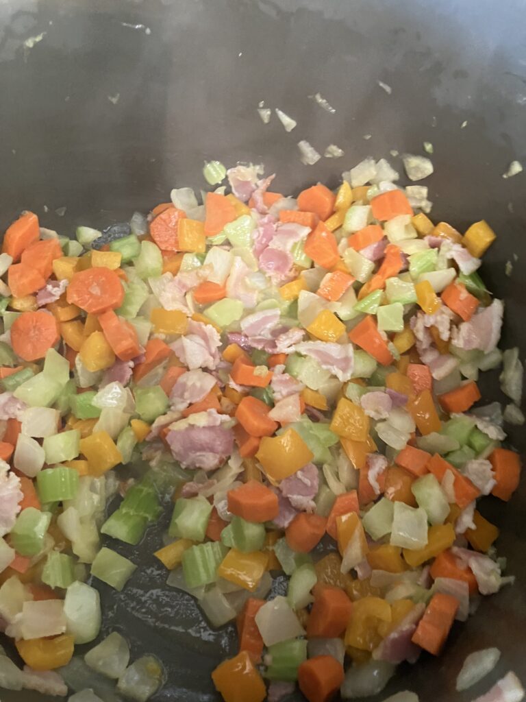 Cooked celery, onions, carrots, and bell peppers. 