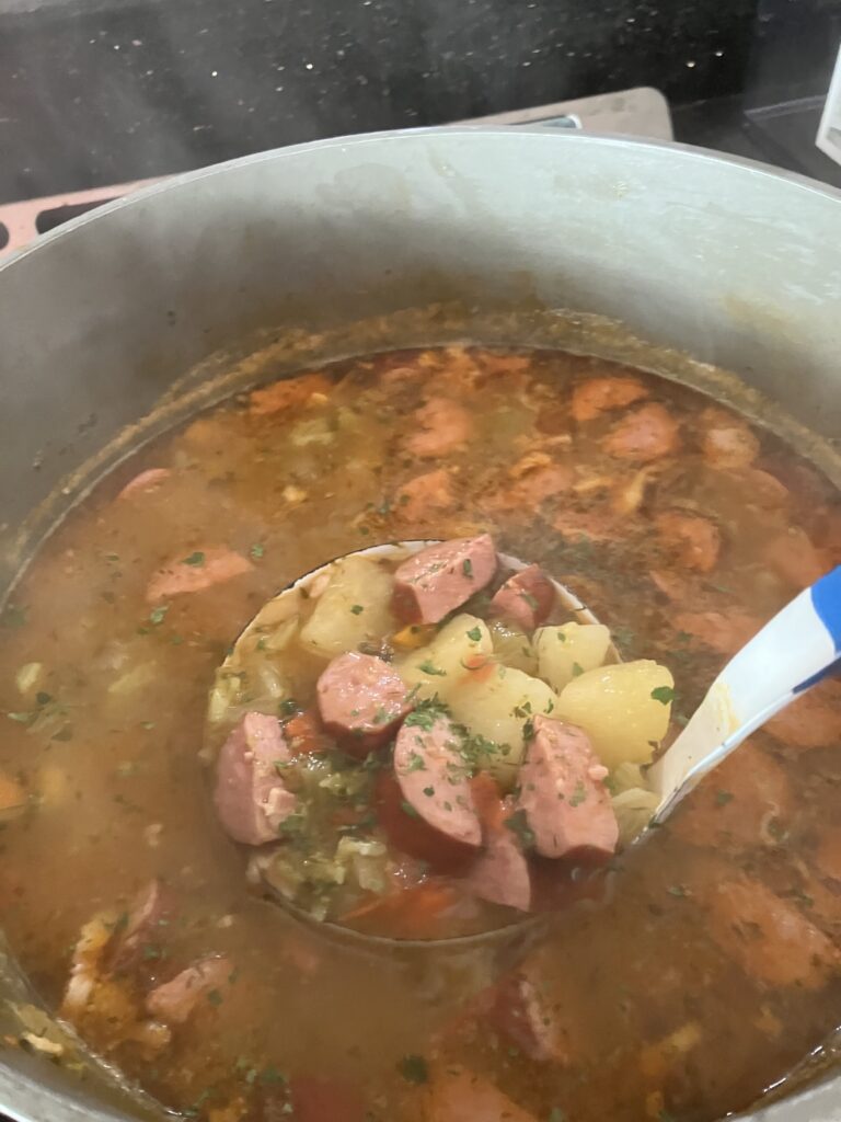 A pot of Kielbasa Soup with potatoes. 