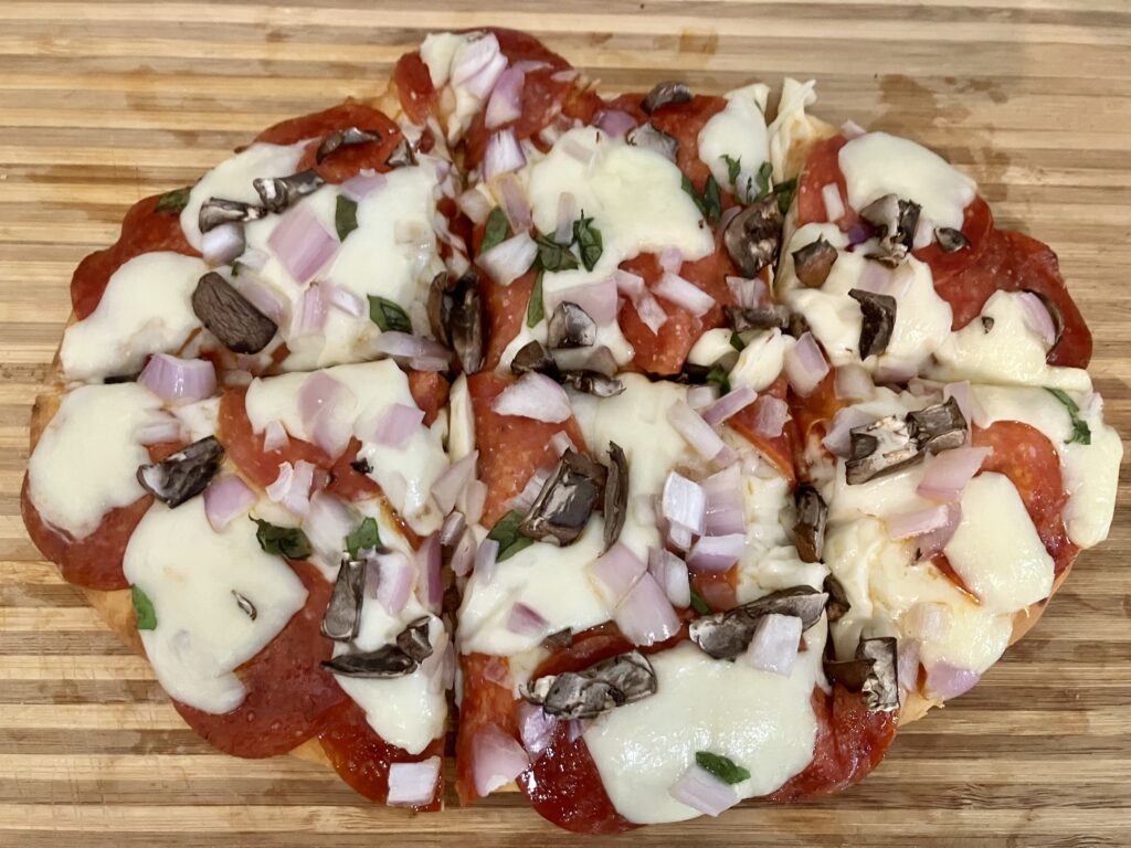 Pepperoni Flatbread with mushrooms and chives.