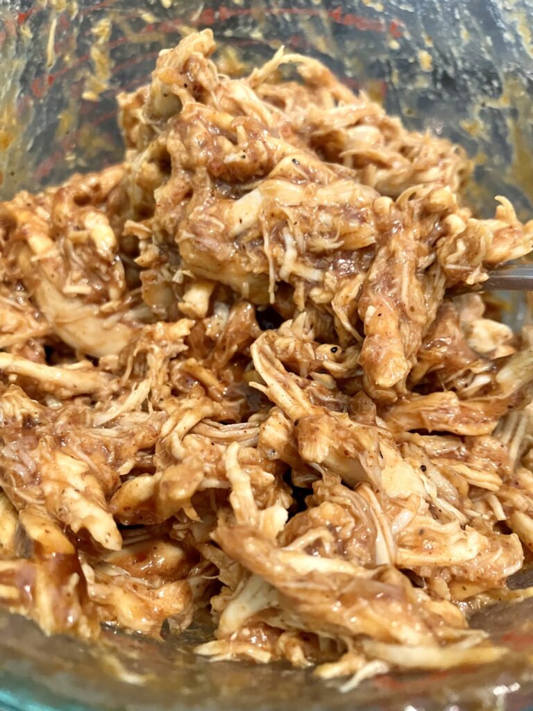 Shredded chicken with Barbecue (BBQ) sauce. 