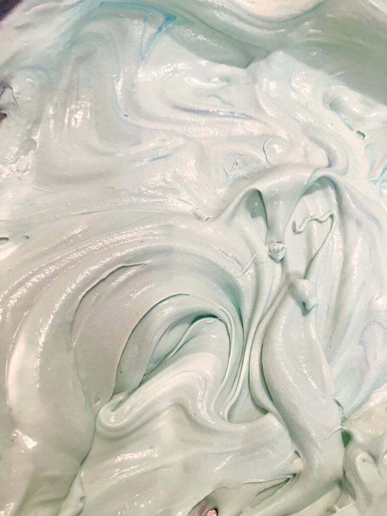 Added blue food coloring to ice cream base.