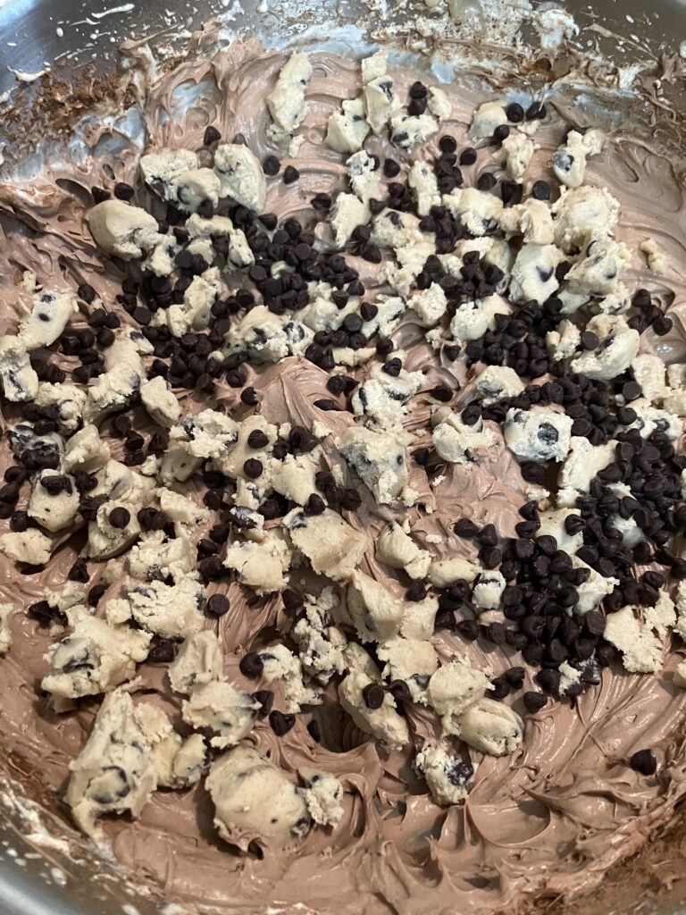 Cookie dough and chocolate chips added to the ice cream base. 