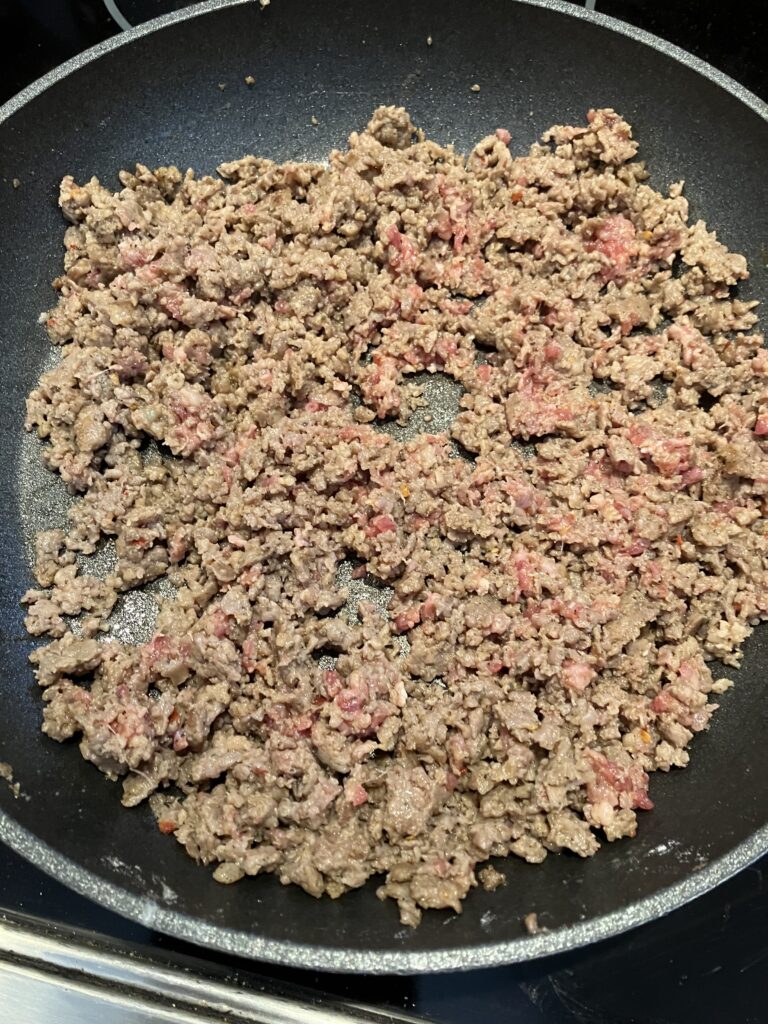 Cooked ground sausage. 