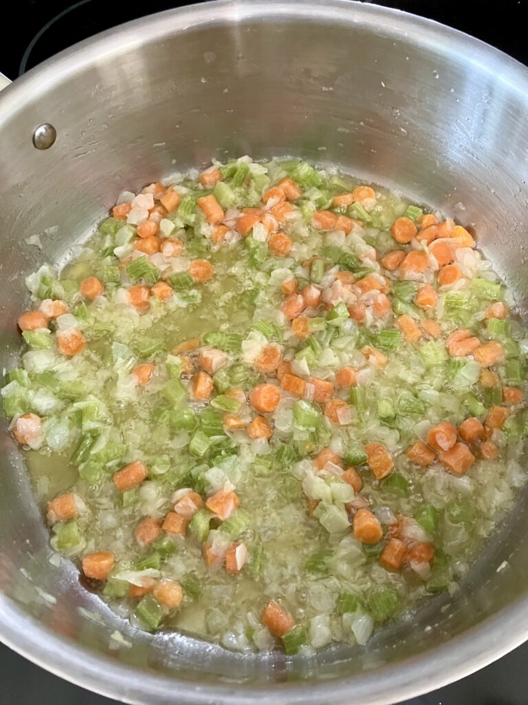 Celery, onions, and carrots cooking. 