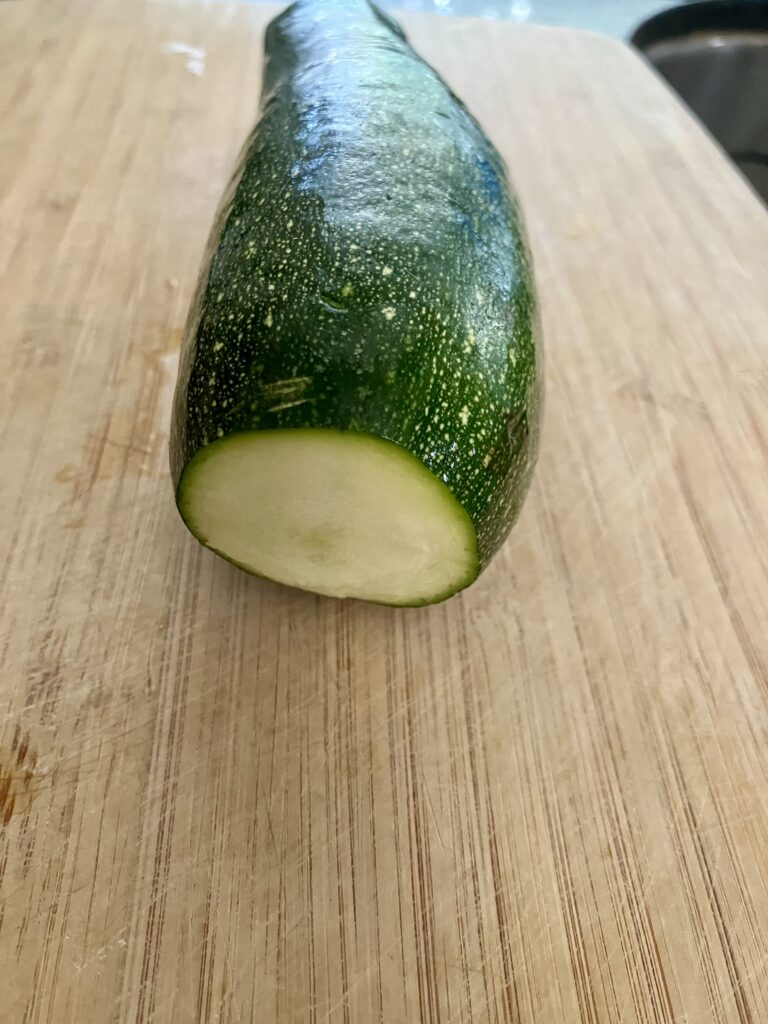 Zucchini with ends cut off. 