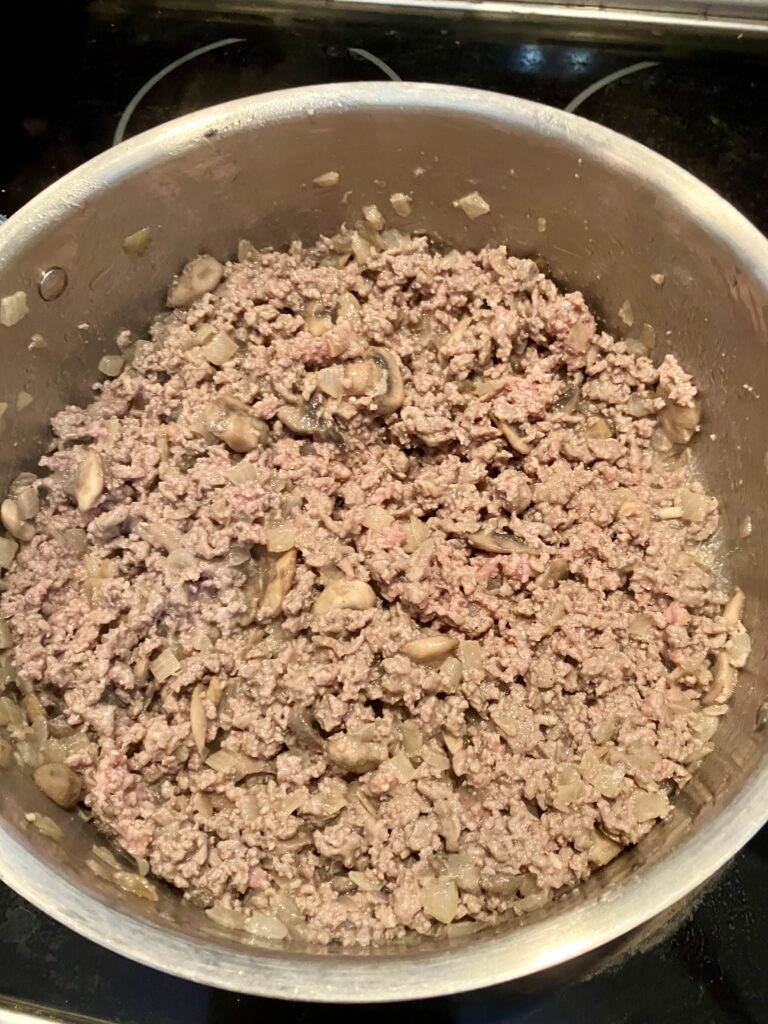 Cooked ground beef for sauce (flour added for thickener).