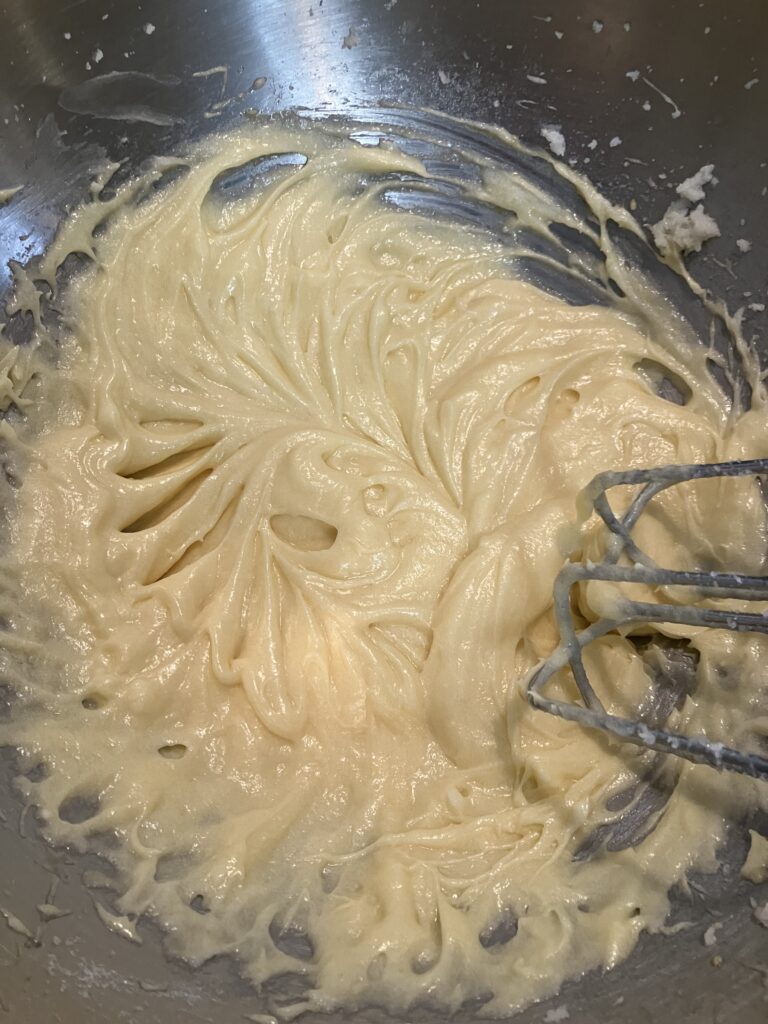 In a large bowl, cream the shortening, granulated sugar, vanilla and eggs.  The shortening will help keep cake from spreading too much, while the butter adds that delicious taste.  