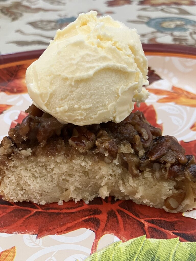 Pecan Upside Down Cake with vanilla ice cream.