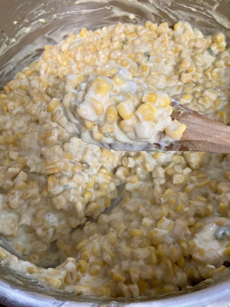 Add cream cheese to the jalapeno creamed corn. 