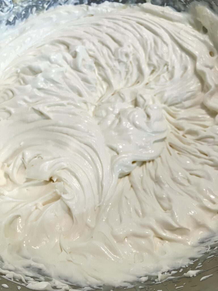 Heavy cream whipped with sweetened condensed milk. 