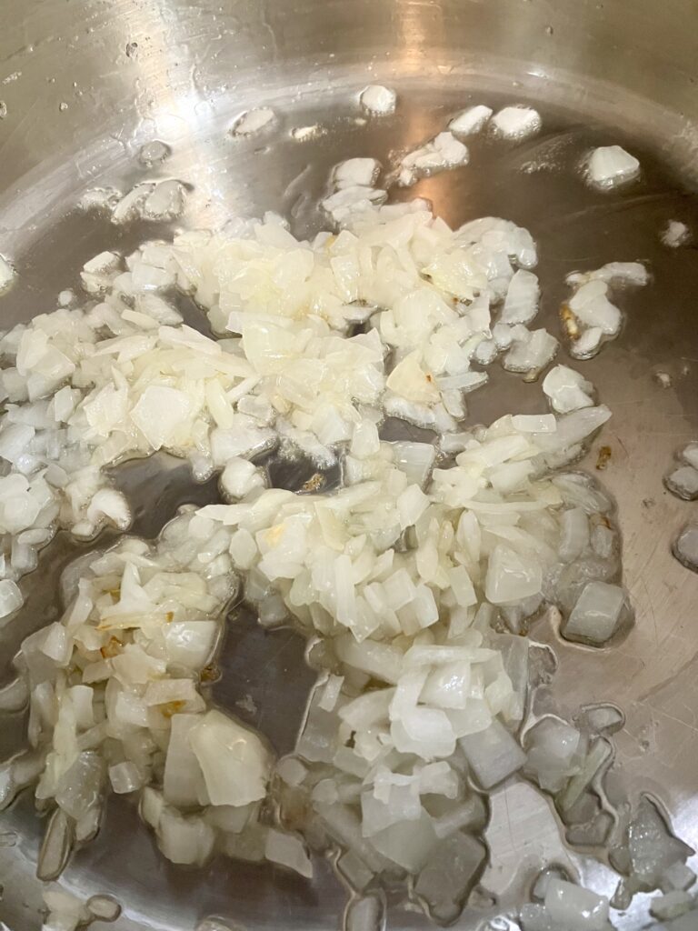 Onions cooking in olive oil. 