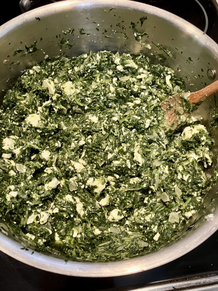 Spinach mixture with Feta cheese for spanakopita. 