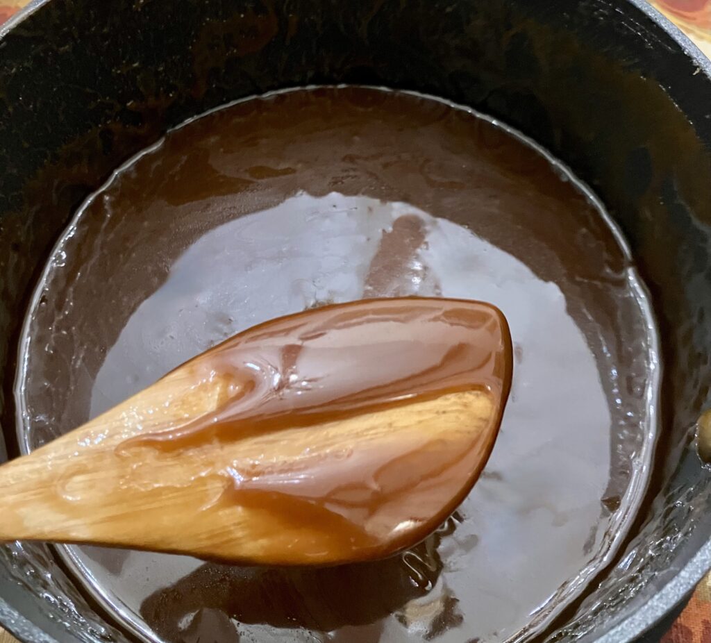 Rum sauce in a saucepan. 